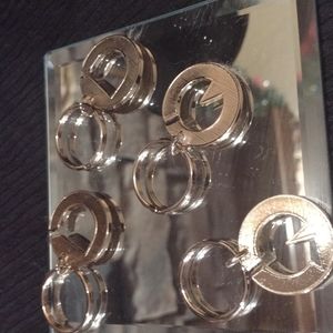 1985 Vintage Goldtoned initial interlocking key ring  nib D,C,& G